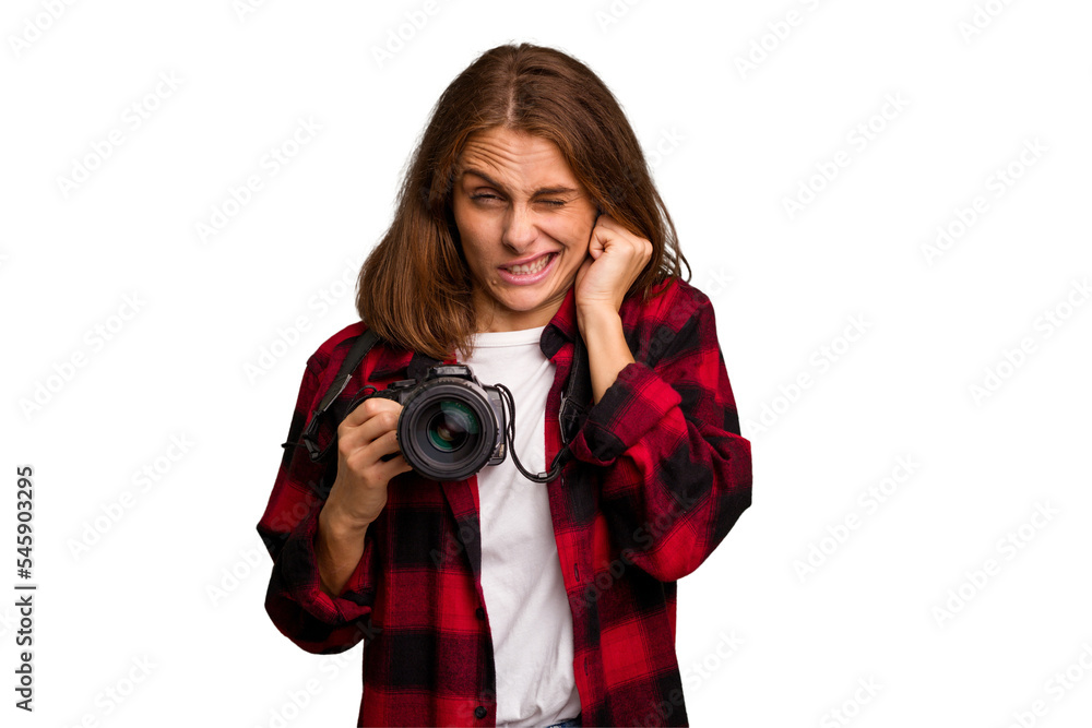 Young photographer caucasian woman isolated covering ears with hands. Young photographer caucasian woman isolated covering ears with hands.
