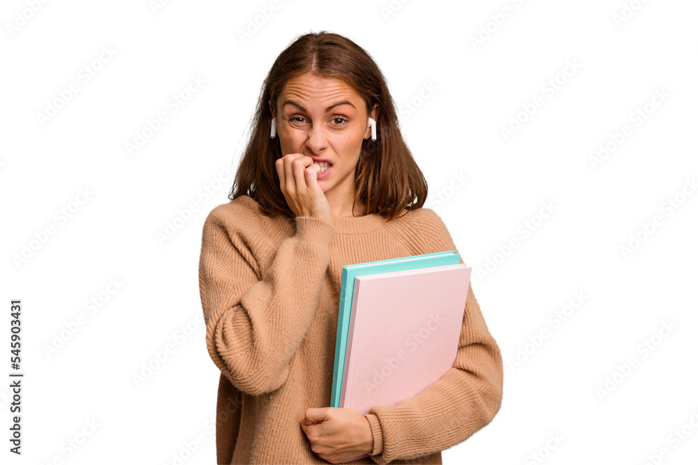 Young student woman holding a books isolated biting fingernails, nervous and very anxious. Young student woman holding a books isolated biting fingernails, nervous and very anxious.