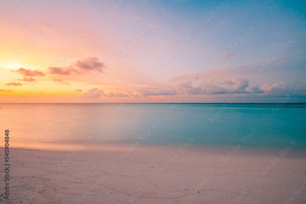 Fototapeta premium Closeup sea sand beach. Beautiful beach landscape. Inspire tropical beach seascape horizon. Dreamy sunset sky calm tranquil relax sunset summer mood. Positive energy, meditation summer tropical island