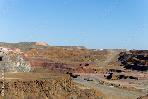View of Mining activity in Minas de Riotinto in Spain. Apocalypse scenery. Mining village in Andalusia. Earth destruction. Disruption of nature. Extracting natural resources from the Earth.