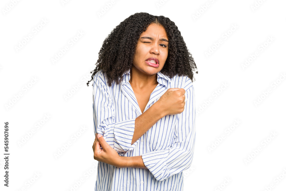 Young african american woman isolated massaging elbow, suffering after a bad movement. Young african american woman isolated massaging elbow, suffering after a bad movement.