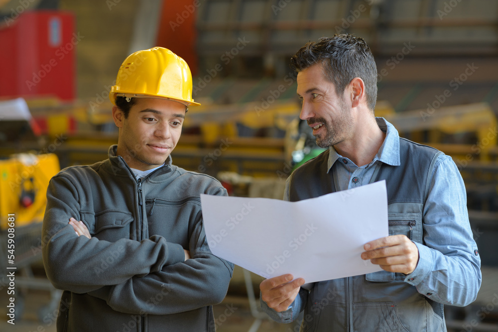 workers and manager at factory workers and manager at factory