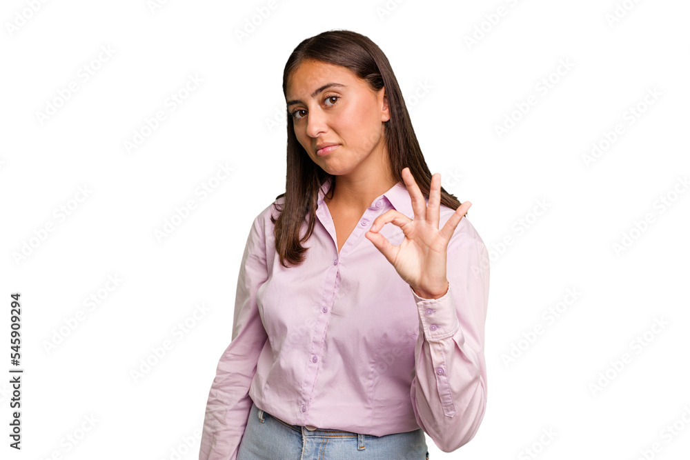 Young cute caucasian woman isolated winks an eye and holds an okay gesture with hand. Young cute caucasian woman isolated winks an eye and holds an okay gesture with hand.