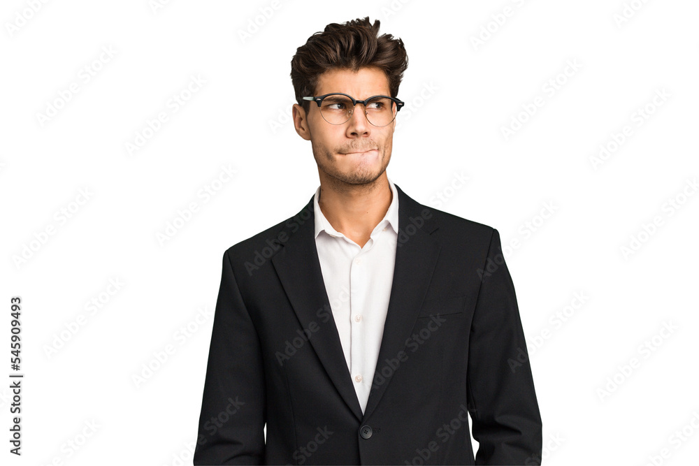 Young caucasian business man isolated confused, feels doubtful and unsure. Young caucasian business man isolated confused, feels doubtful and unsure.