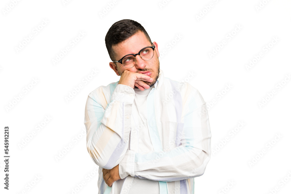 Young caucasian man isolated tired of a repetitive task. Young caucasian man isolated tired of a repetitive task.