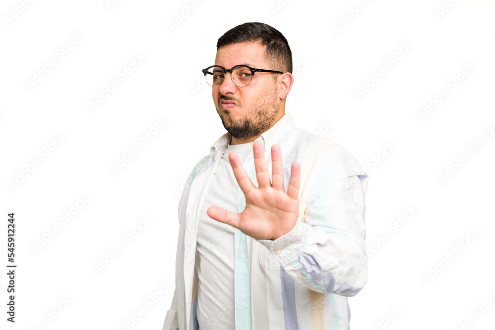Young caucasian man isolated being shocked due to an imminent danger Young caucasian man isolated being shocked due to an imminent danger