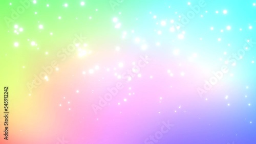 シームレスな虹色のアブストラクト背景と光のパーティクル
