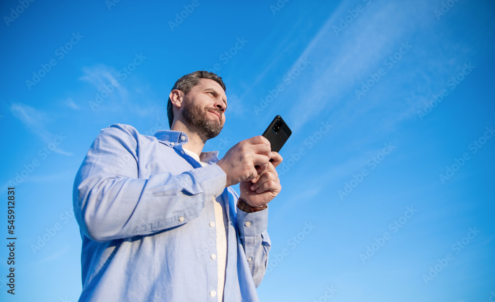 man chat on smartphone with message. man chatting on phone messaging. smartphone communication.