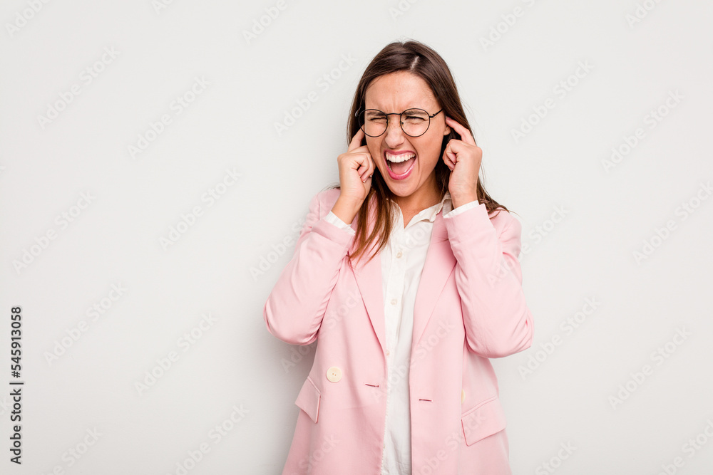 Business caucasian woman isolated on white background covering ears with hands. Business caucasian woman isolated on white background covering ears with hands.
