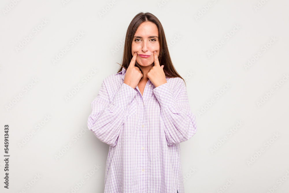 Young caucasian cute woman isolated on white background doubting between two options. Young caucasian cute woman isolated on white background doubting between two options.