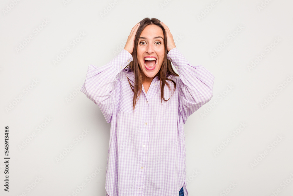 Young caucasian cute woman isolated on white background screaming, very excited, passionate, satisfied with something. Young caucasian cute woman isolated on white background screaming, very excited, passionate, satisfied with something.