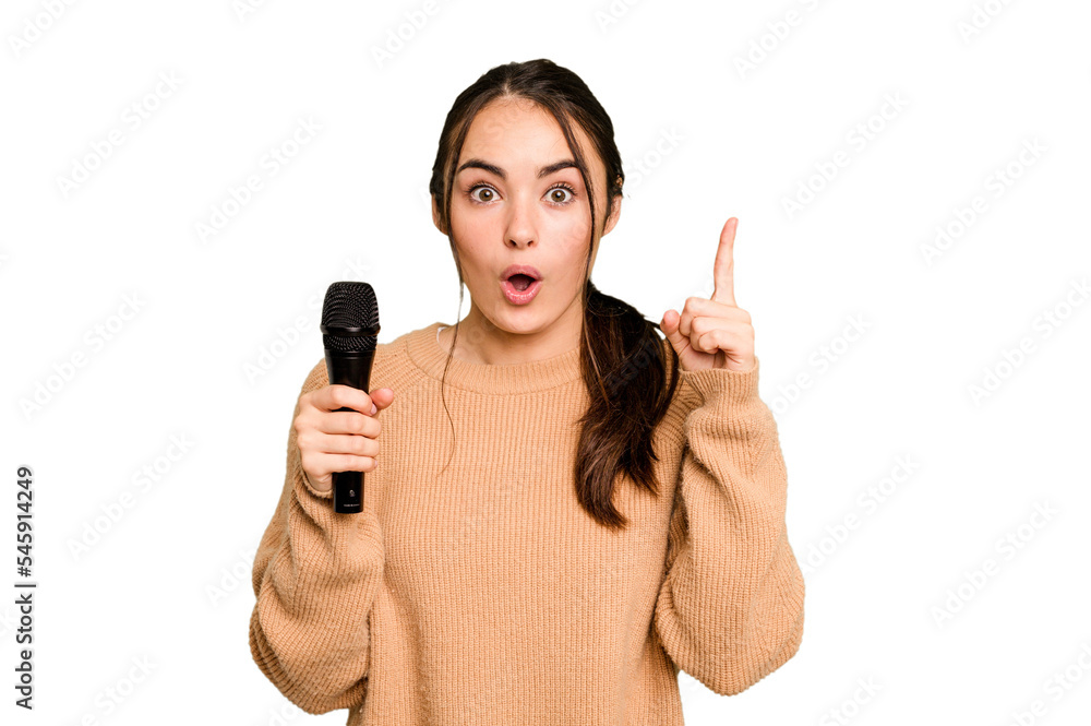 Young caucasian singer woman isolated on green chroma background having an idea, inspiration concept. Young caucasian singer woman isolated on green chroma background having an idea, inspiration concept.