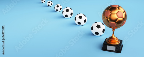 3D Render Golden Winning Trophy With Soccer Balls Over Blue Background And Copy Space.