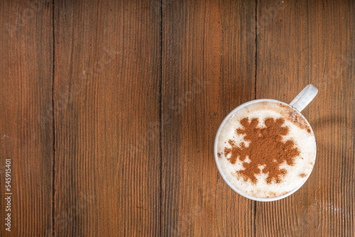 Latte coffee with a snowflake pattern