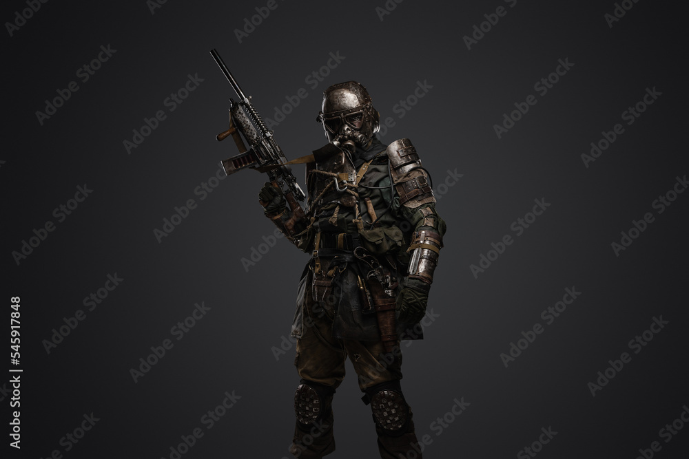 Portrait of isolated on grey stalker surviving in post apocalypse. Portrait of isolated on grey stalker surviving in post apocalypse.