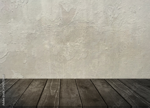 Empty wood table top with concrete wall