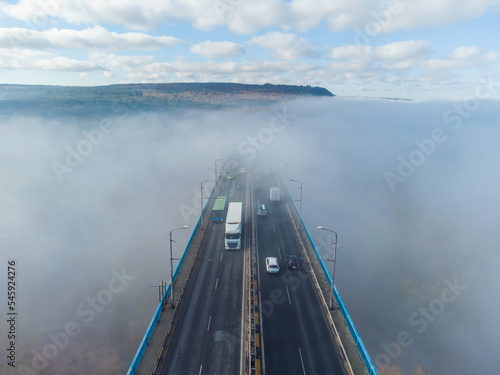 Aerial view of the Asparuhov bridge in the fog in the morning, Varna, Bulgaria photo