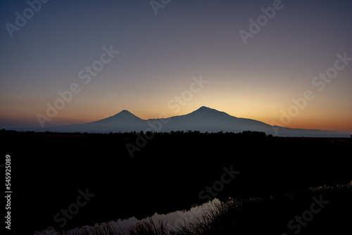 Beautiful natural landscape with mountain and river. Sunset and mountain