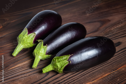 Frsh organic eggplant on the wooden boards photo