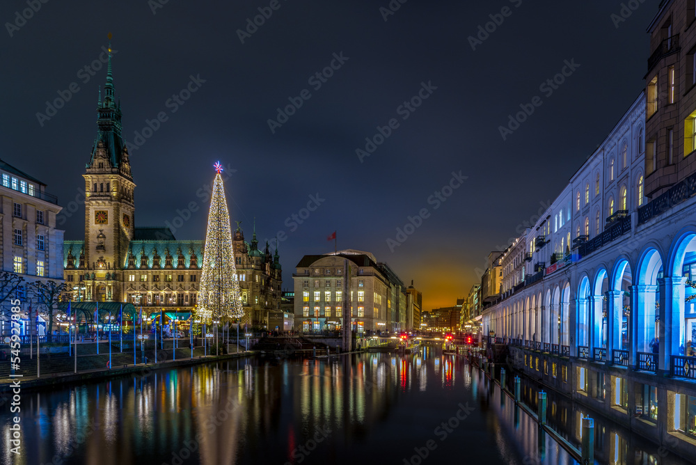 Festive Hamburg during christmas time and the illuminated canal