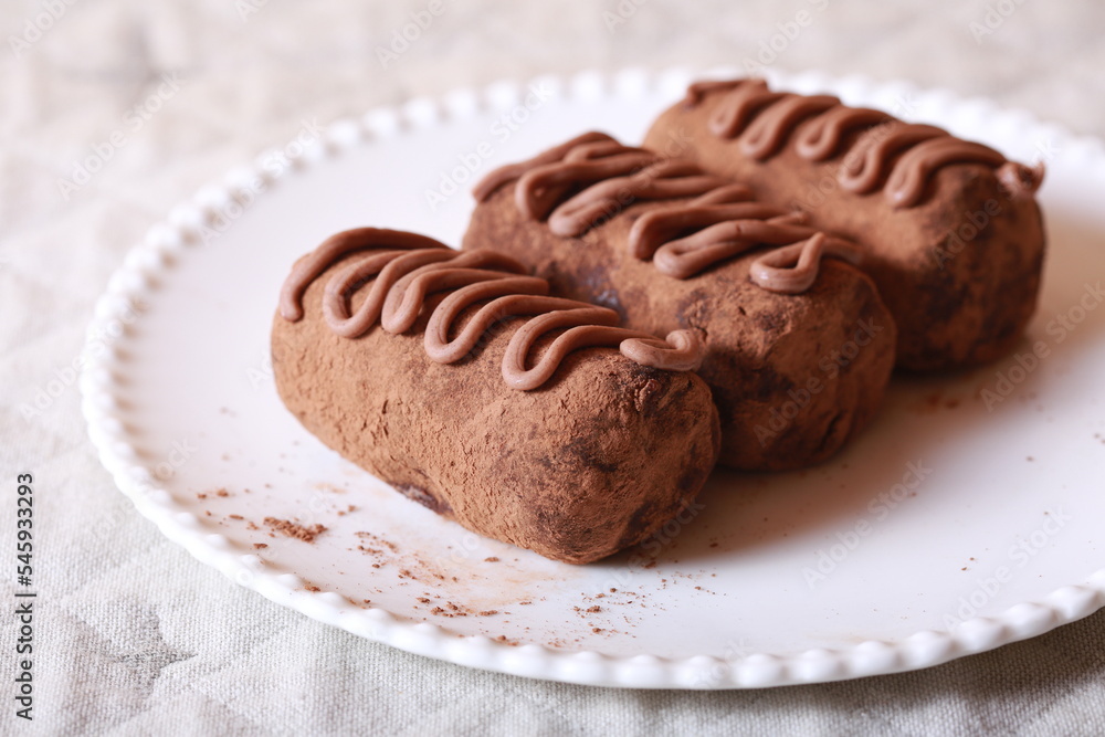 Fototapeta premium Chocolate cakes on a plate close-up
