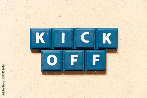 Obraz na plátně Tile letter in english word kick off on wood background