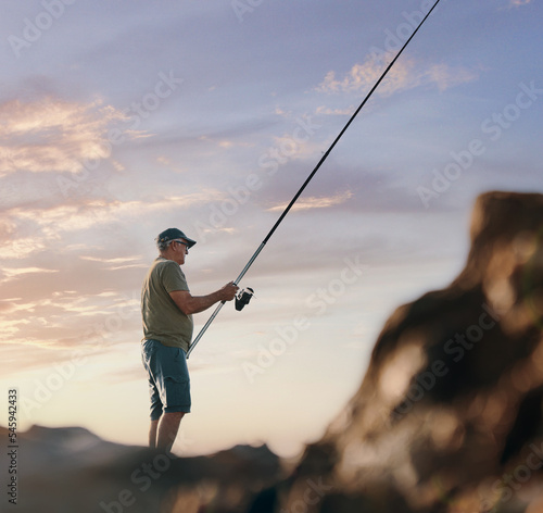 Fisher man rock sea rod sunrise Fototapet