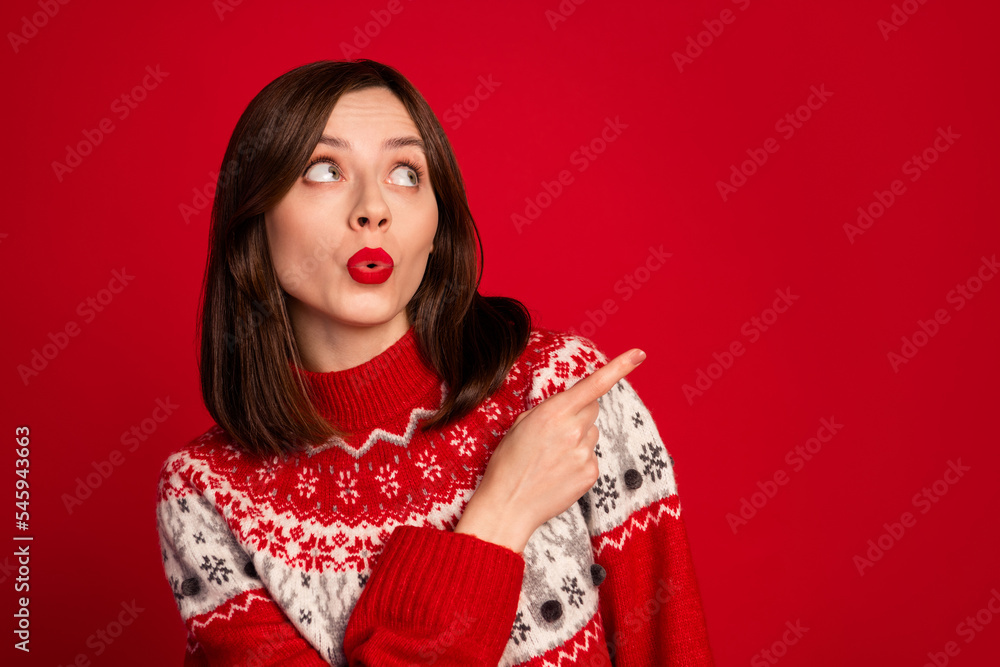 Portrait of speechless astonished woman bob hairdo wear red sweater look directing empty space discount isolated on red color background Portrait of speechless astonished woman bob hairdo wear red sweater look directing empty space discount isolated on red color background