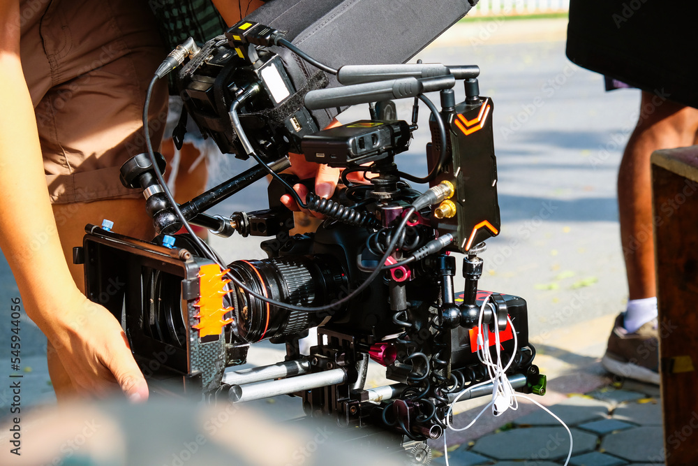 Fototapeta premium detail of Video camera , film crew production, behind the scenes background