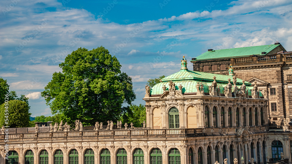Panoramic cityscape over historical and touristic center in Dresden, Germany, downtown, Zwinger Palace with many sculptures and garden