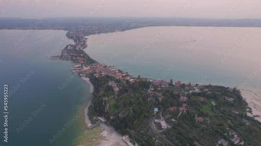 Aerial drone view of the Sirmione peninsula on Lake Garda, Italy. Aerial drone view of the Sirmione peninsula on Lake Garda, Italy.