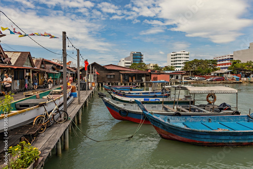 Historical Chew Jetty with wooden fishing boats, Unesco World Heritage site, George Town, Penang, Malaysia