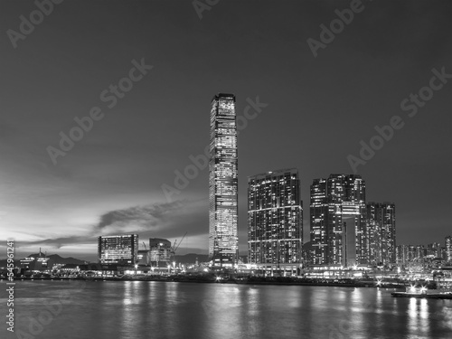 Scenery of skyscraper, skyline and harbor of Hong Kong city at dusk