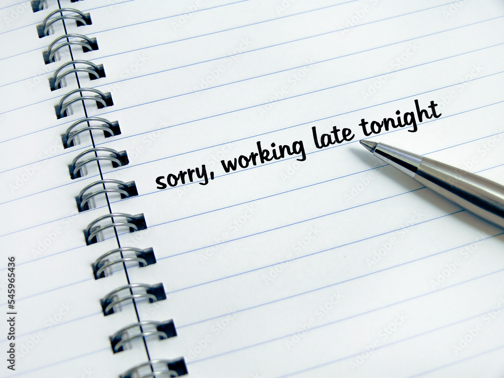pen and diary with phrase: working late tonight pen and diary with phrase: working late tonight