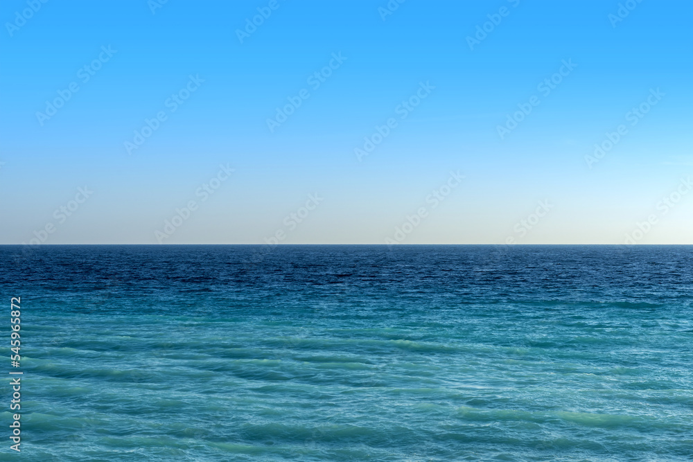 turquoise blue sea and gradient light blue sky background