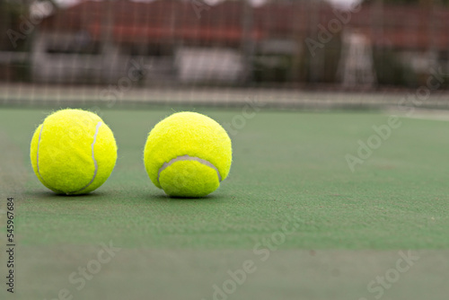 Man play tennis ball and tennis racquet, Professional tennis player, Sport and healthy lifestyle, concept of outdoor game sports, racket and green ball.