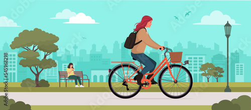 Fashionable woman riding a bicycle