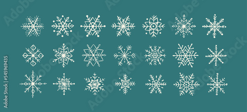 Collection hand drawn snowflakes isolated on blue background. Snowflake doodle icon