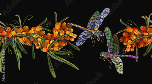 Sea buckthorn berries branch and dragonflies. Horizontal seamless pattern. Embroidery design. Fashion template for design of clothes, tapestry. Autumn garden art