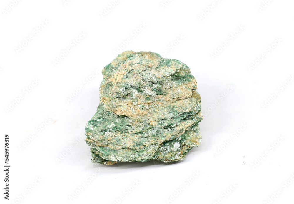 Rough fuchsite stone . Raw semi precious gemstone on white background. Rough fuchsite stone . Raw semi precious gemstone on white background.