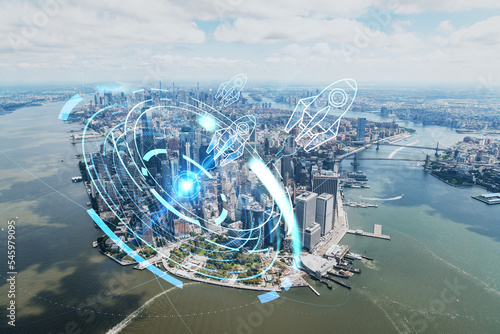 Aerial panoramic helicopter city view on Lower Manhattan district and financial Downtown  New York  USA. Startup company  launch project to seek and develop scalable business model  hologram