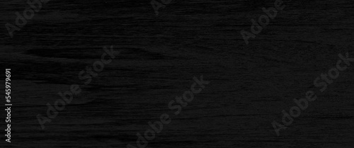 Black paper house on red wood background, real estate concept, black wood background wooden gray pattern old wall top nature, weathered abstract plank.