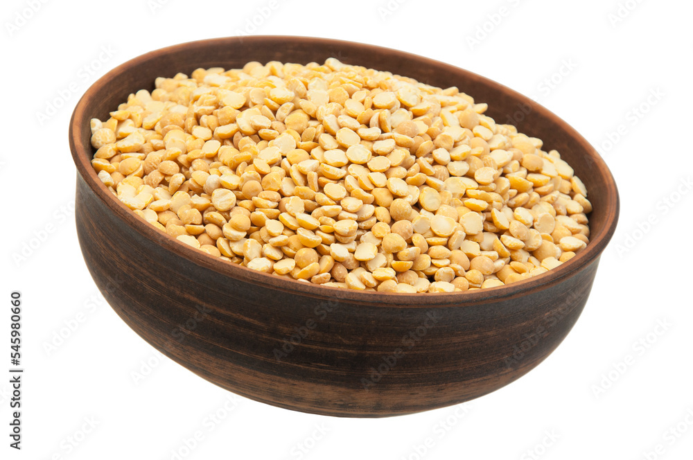 pea groats in a clay bowl. the concept of a good harvest of peas.