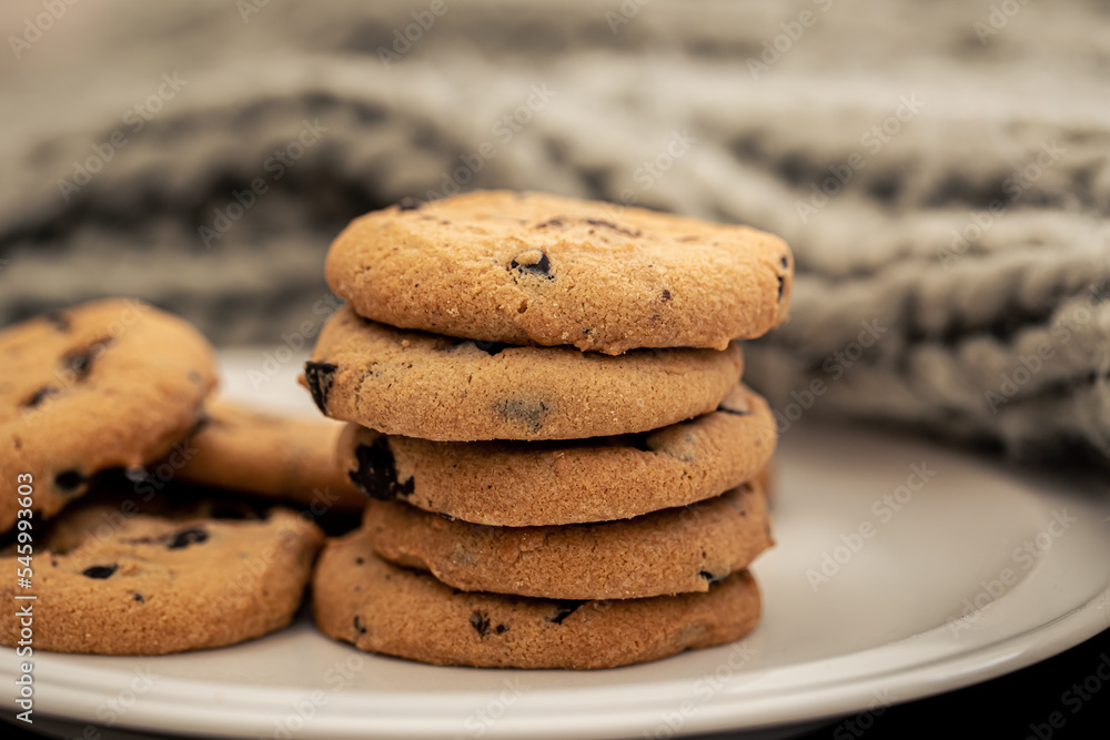 Cookies with chocolate chips close-up on a plate. Cookies with chocolate chips close-up on a plate.