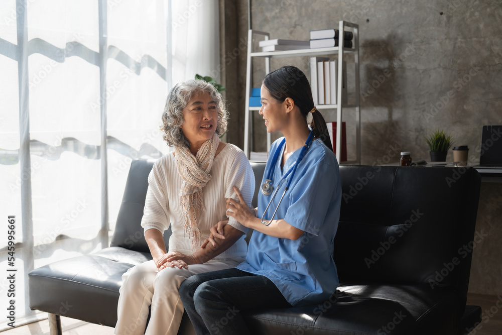Home healthcare nurse, physical therapy with senior adult woman at home Home healthcare nurse, physical therapy with senior adult woman at home