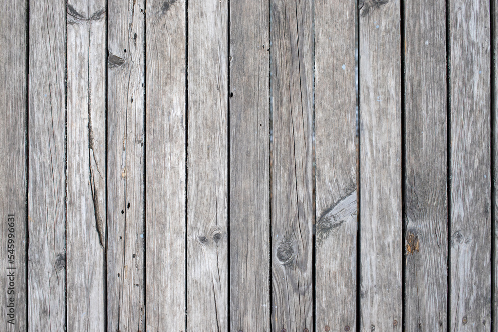 Old gray wooden fence, background texture. Old gray wooden fence, background texture.