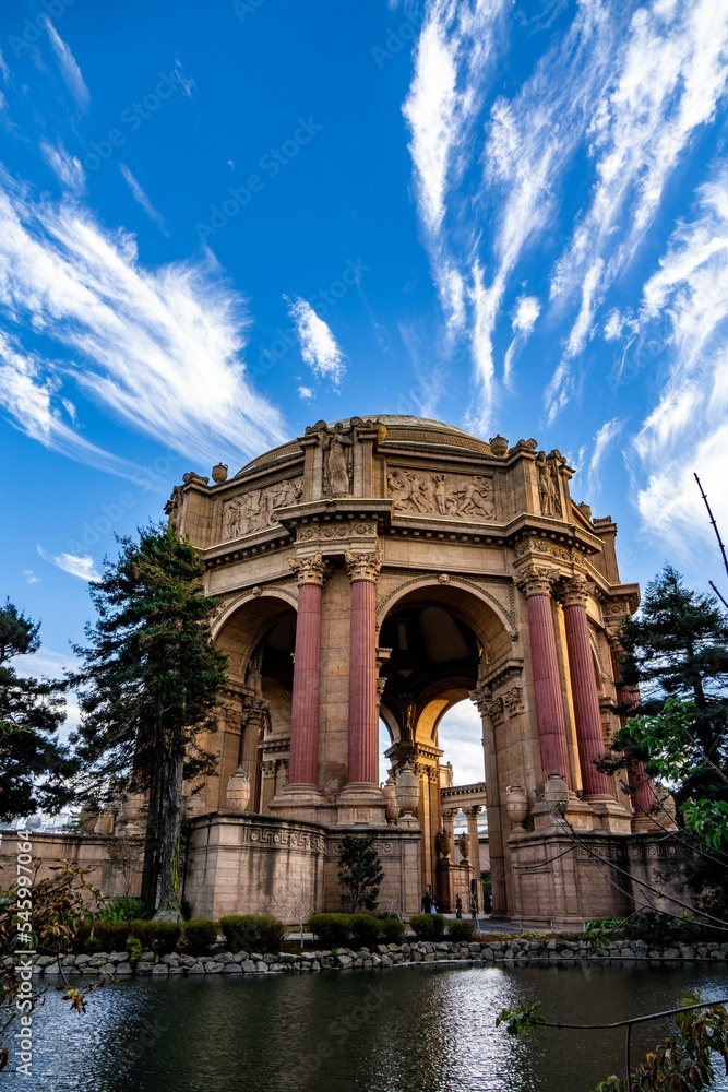Vertical view of Palace of fine arts at San Francisco with waterfront and cloudy sky