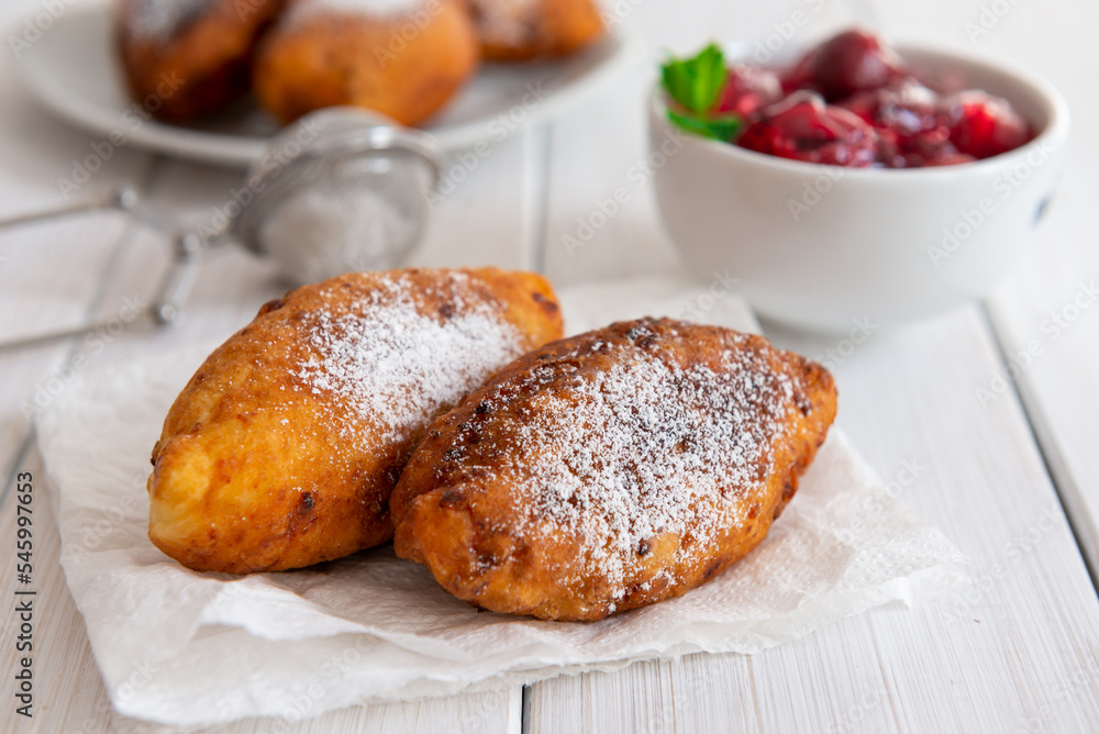 Fried patties with cherries and strawberries, homemade food