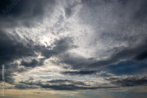 Beautiful moody sky with dark clouds at sunset, sky remplacement, nature background