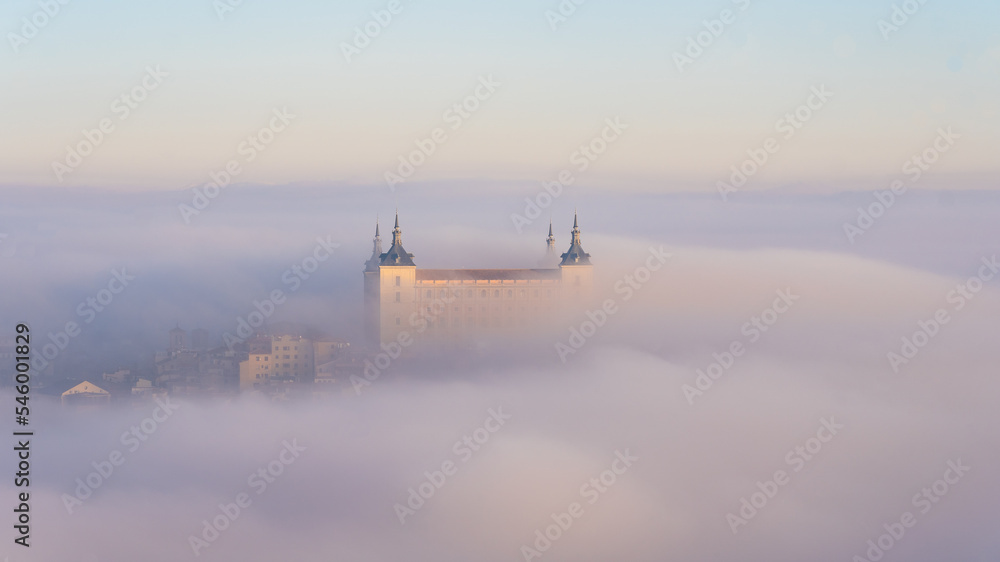 Picturesque scenery of medieval city in fog in sunrise Picturesque scenery of medieval city in fog in sunrise